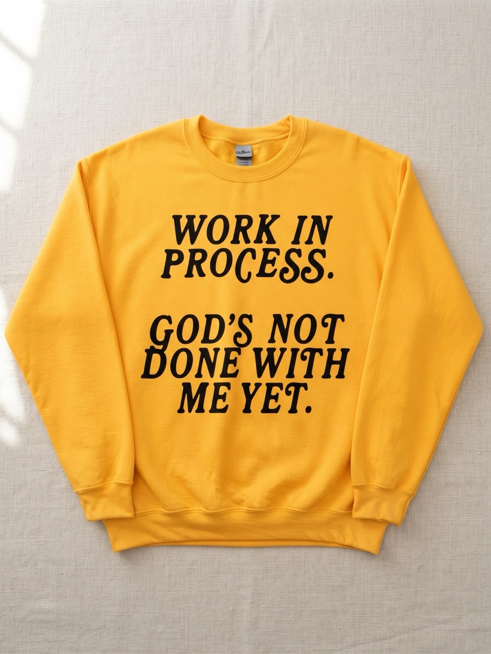 Mustard Yellow Crewneck Sweatshirt with Black 'Work In Process' Print